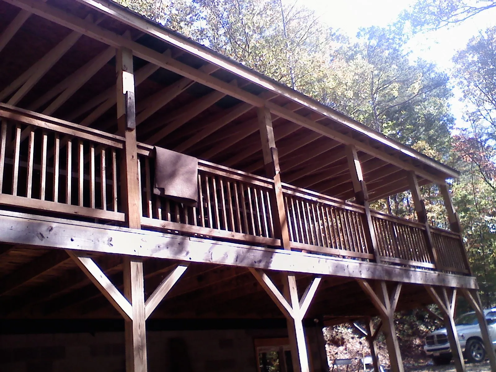 Timber framing under a new elevated porch and deck — Roof Leak Repair in Milwaukee by Roofing Brothers
